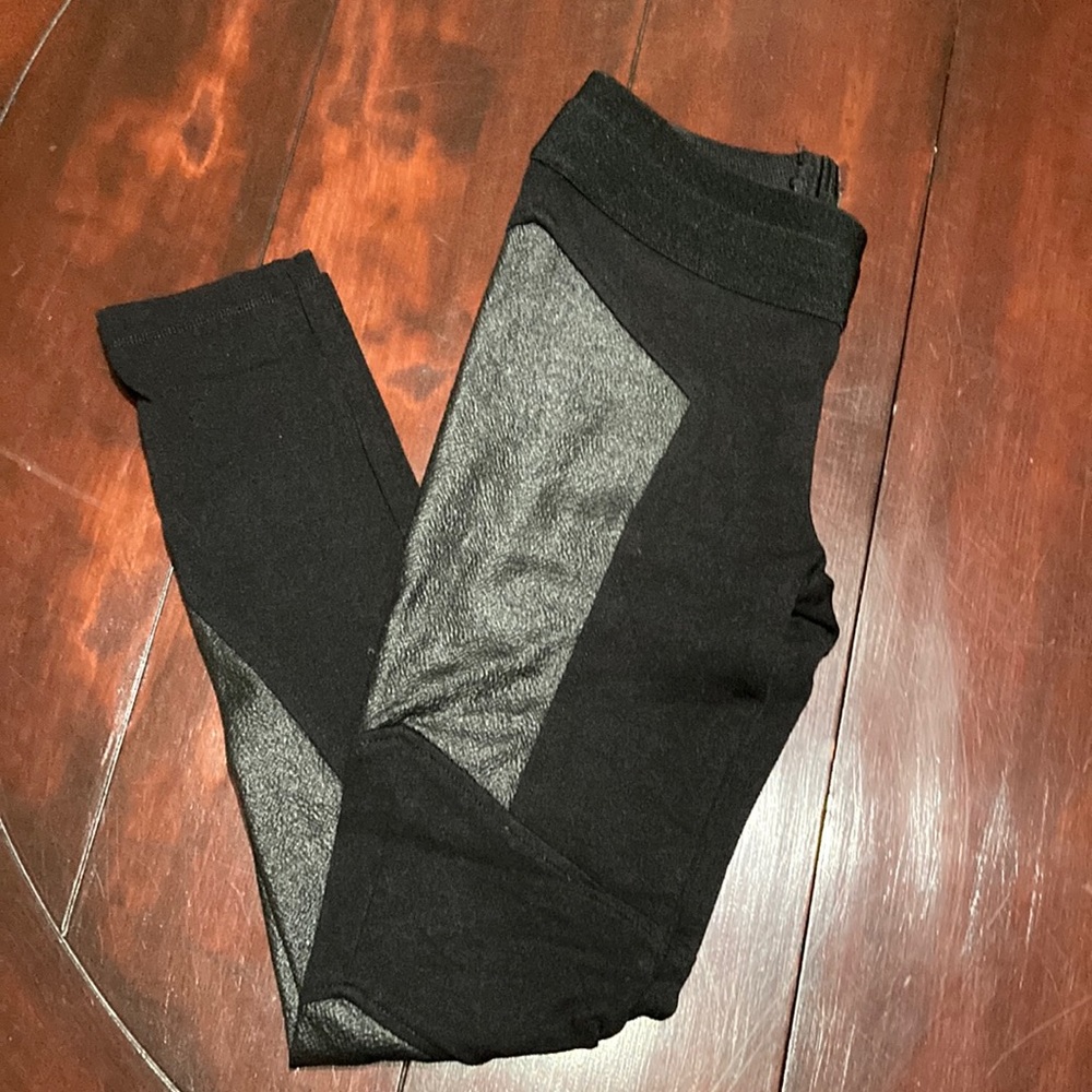 Really cute and sexy leggings with faux snake skin on the side.